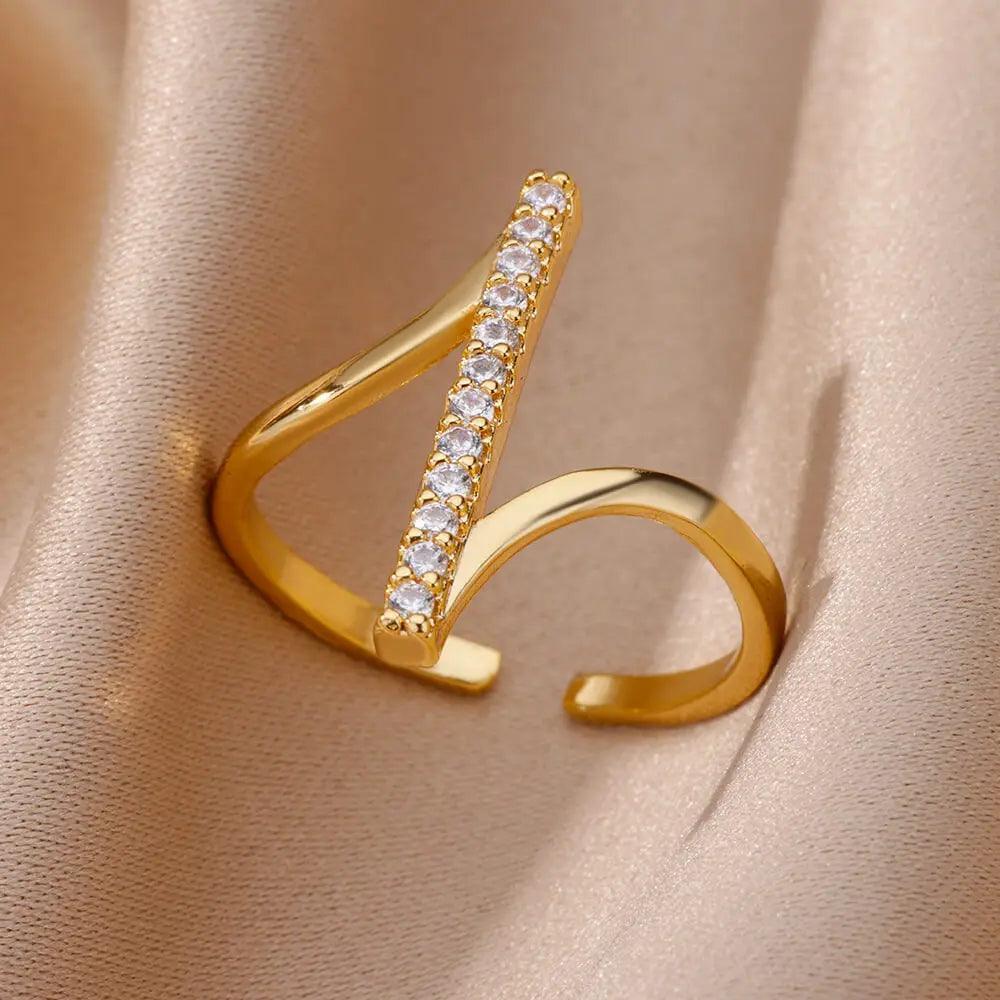 Anel Dourado Linear Curvo com Zircônia em Aço Inoxidável - Ravelle Luxe