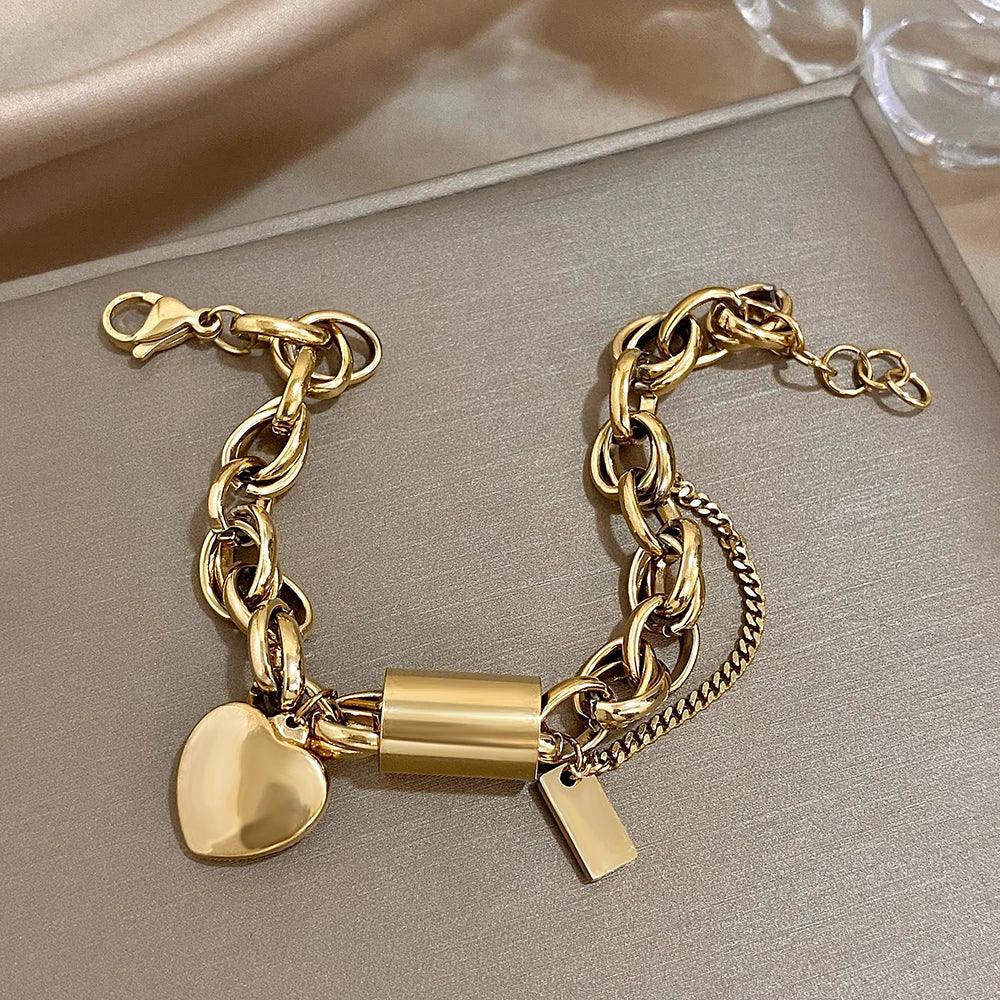 Pulseira Dourada Chunky com Pingente de Coração em Aço Inoxidável - Ravelle Luxe