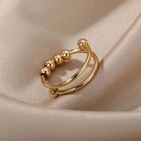 Anel Dourado Fidget Ajustável com Esferas Rotativas Banhado em Ouro 18K - Ravelle Luxe