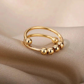 Anel Dourado Fidget Ajustável com Esferas Rotativas Banhado em Ouro 18K - Ravelle Luxe