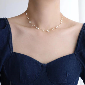 Colar Dourado de Pérolas Simuladas com Camadas Trançadas em Aço Inoxidável - Ravelle Luxe