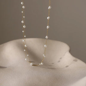 Colar Dourado de Pérolas Simuladas com Camadas Trançadas em Aço Inoxidável - Ravelle Luxe