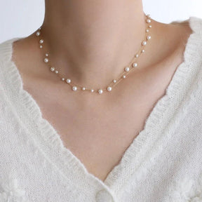 Colar Dourado de Pérolas Simuladas com Camadas Trançadas em Aço Inoxidável - Ravelle Luxe