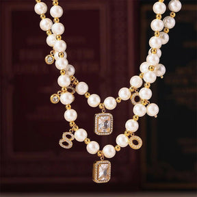 Conjunto de Colar e Pulseira com Pingente Quadrado de Zircônia e Conchas Brancas Banhado a Ouro - Ravelle Luxe