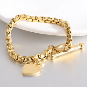 Pulseira Dourada de Coração Estilo OT Lock em Aço Inoxidável - Ravelle Luxe